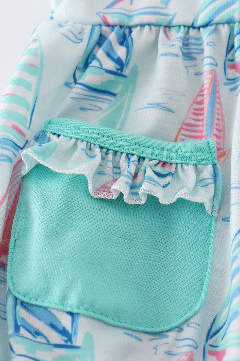 Green sailboat print ruffle bubble